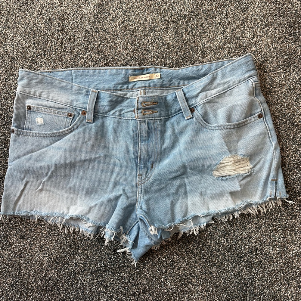 Levi’s Distressed Light Blue Denim Shorts